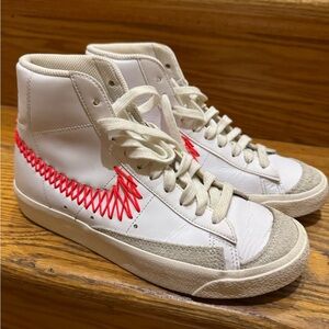 Nike White High-Top Sneakers with Red Accents